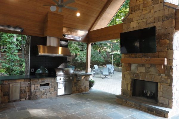 A covered porch completed with a professional deck remodel