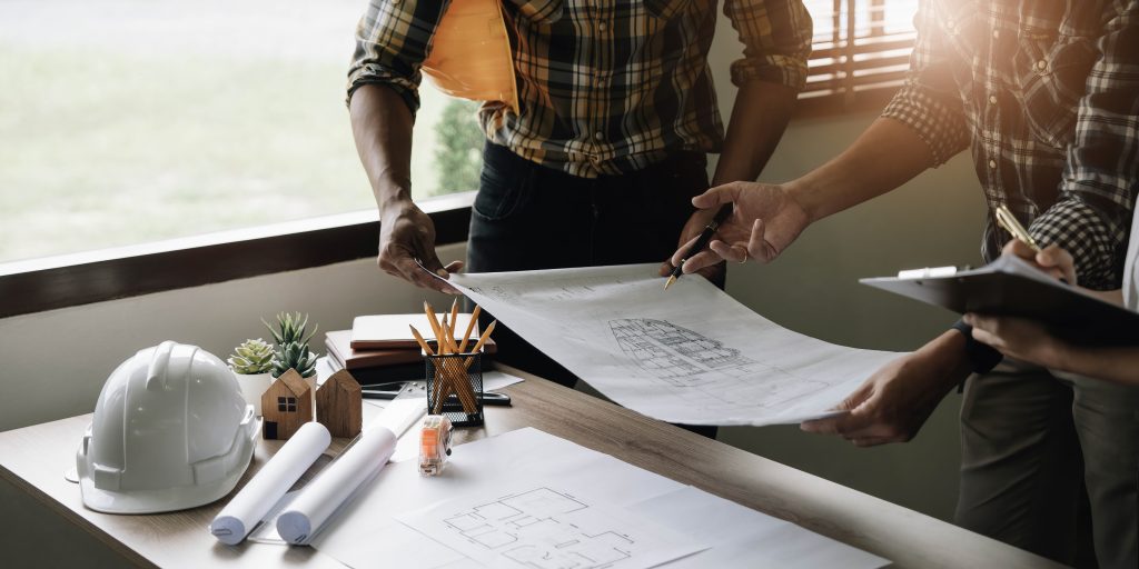 construction team planning home remodel
