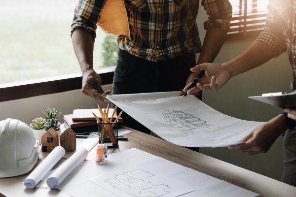 construction team planning home remodel