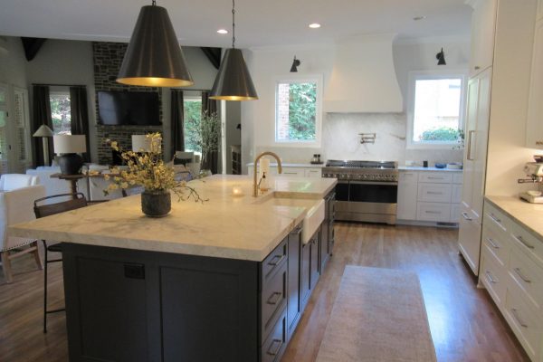 Remodeled kitchen with built-in features by Norm Hughes Homes