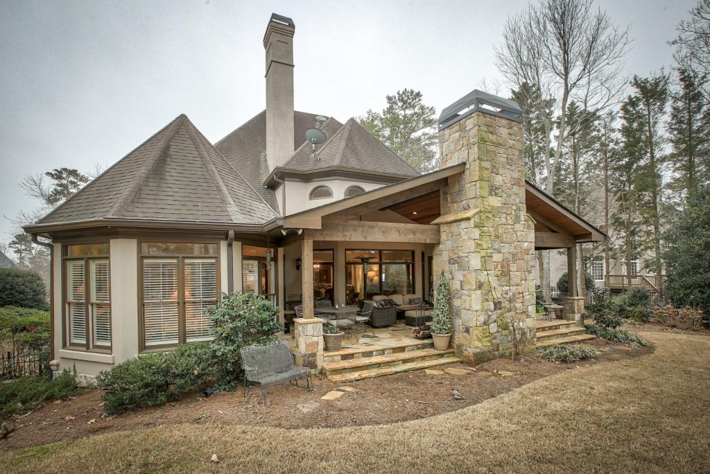 Remodeled porch as part of a custom home remodel by Norm Hughes Homes