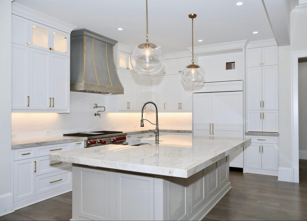 Modern home remodel in  kitchen with custom cabinetry by Norm Hughes Homes