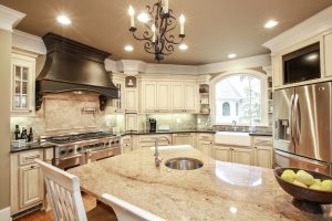 Custom kitchen remodel with granite countertops and white cabinets
