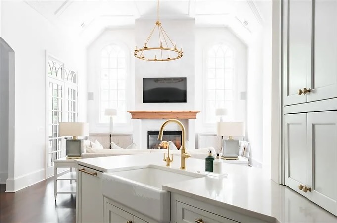 Elegant luxury living room with refined furnishings and architectural details by Norm Hughes Homes