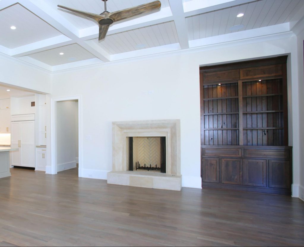 Traditional wood-burning fireplace by Norom Hughes Homes
