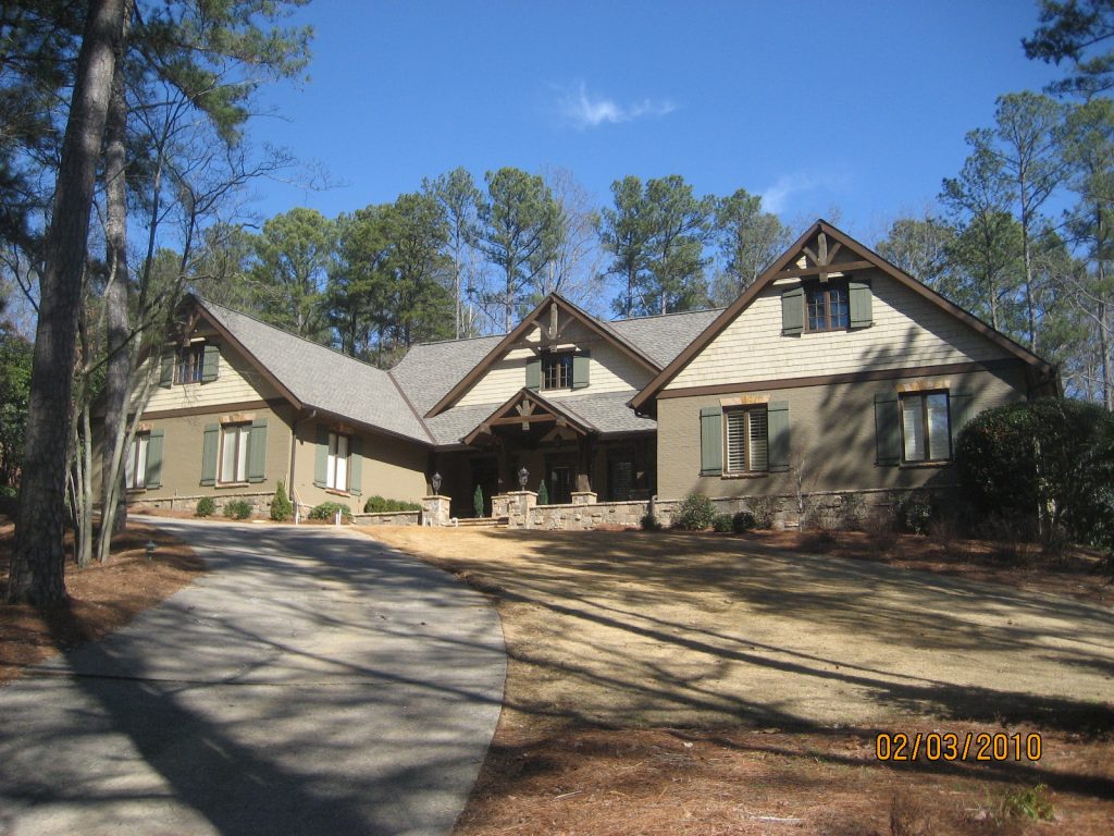 home featuring both vinyl siding and stucco