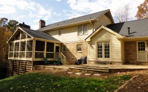 back of a home featuring vinyl siding.