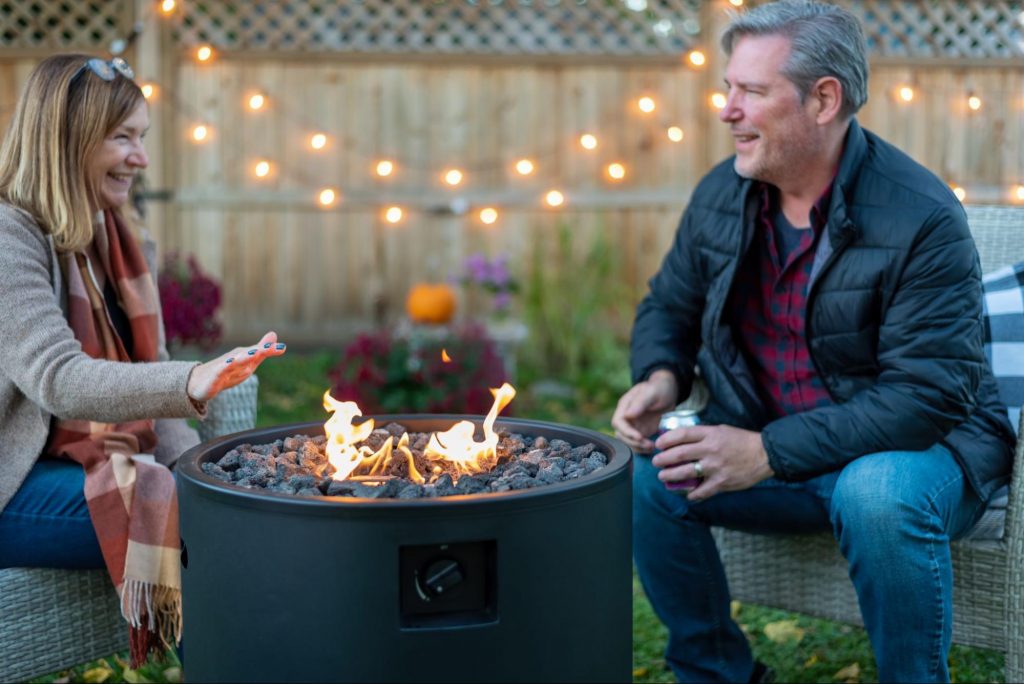 two people sitting around a propane gas fire pit
©Kristen Prahl